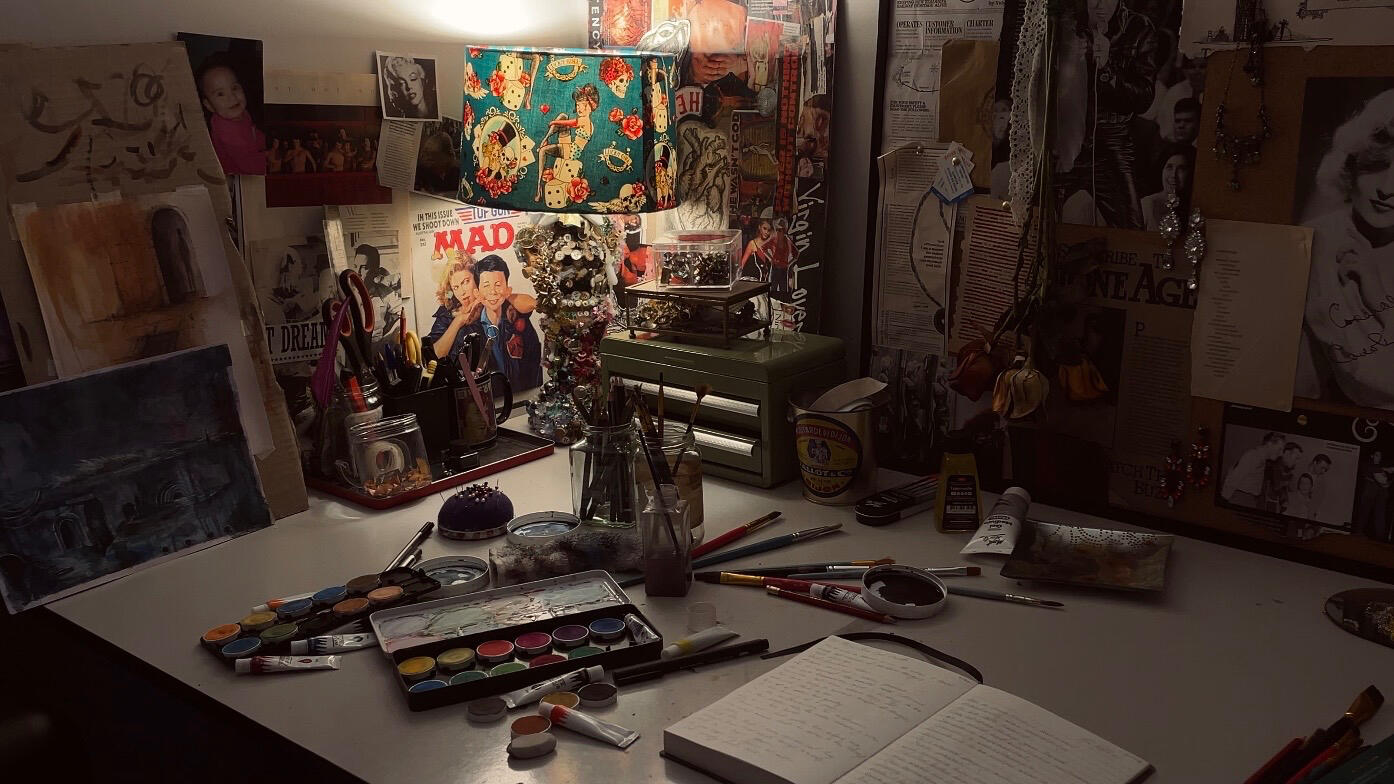 Workspace Studio workspace showing painting materials, sketchbooks and collected objects used throughout Jade JennaLee’s practice.